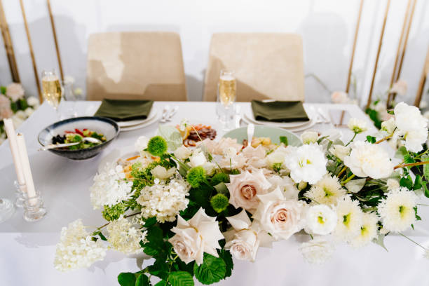 istock The table is served for the bride and groom's table. Wedding decor. Banque 1299998005