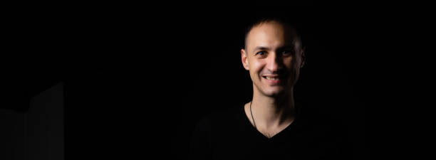 istock portrait of a man black background 1299998294