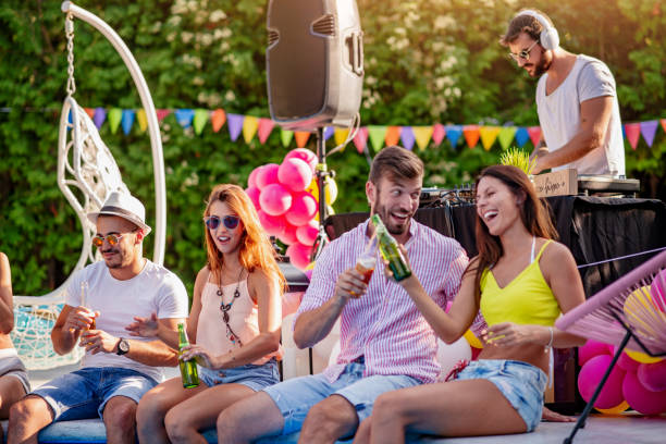 istock Enjoying pool party with friends 1299999700