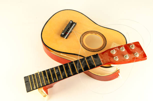 istock Close-up of borken classic guitar 1300000310