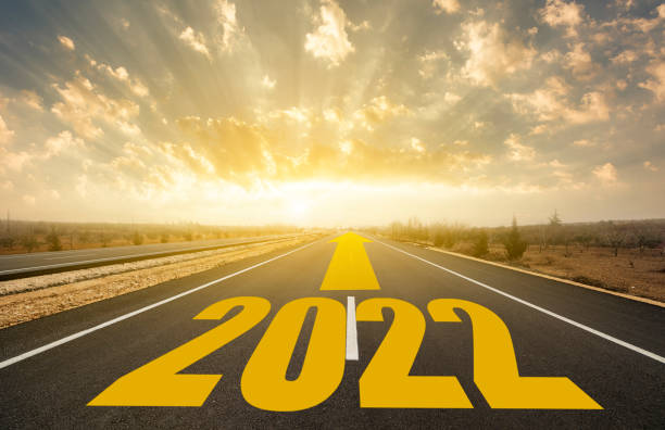 istock The word 2022 written on highway road. 1300006029