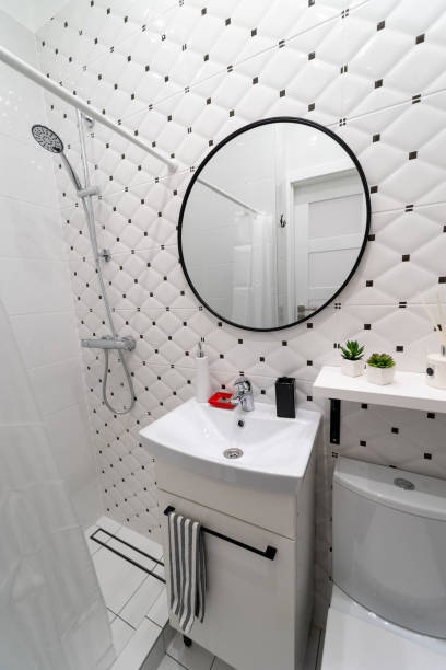 istock Stylish bathroom interior in white and black 1300006167