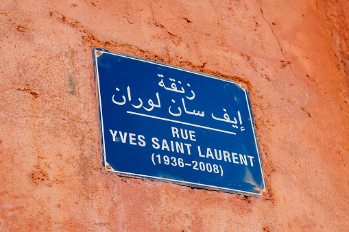 Marrakesh, Morocco - January 16, 2020: Sign showing the famous Rue Yves Saint Laurent in Marrakesh