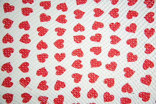 Three red heart shapes over white background. With copy space. Valentine's Day concept