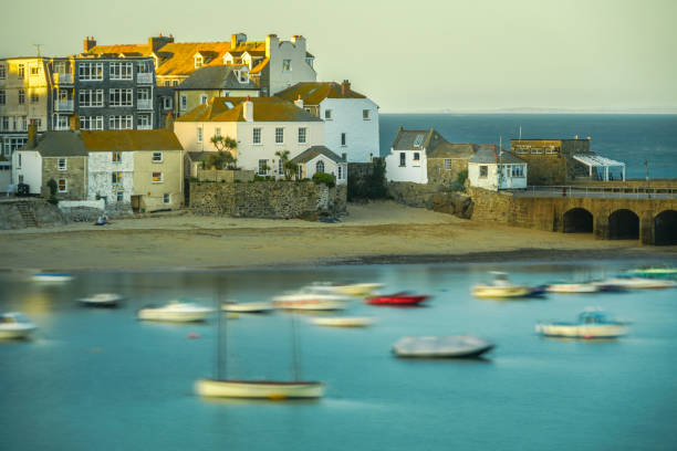 St Ives Harbour, Cornwall. Bobbing boats bathed in the evening golden light.