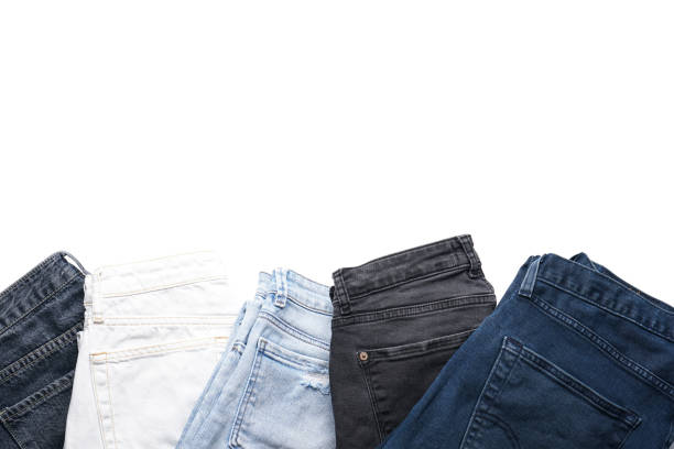 istock A set of folded jeans isolated on white background, top view. 1300012898