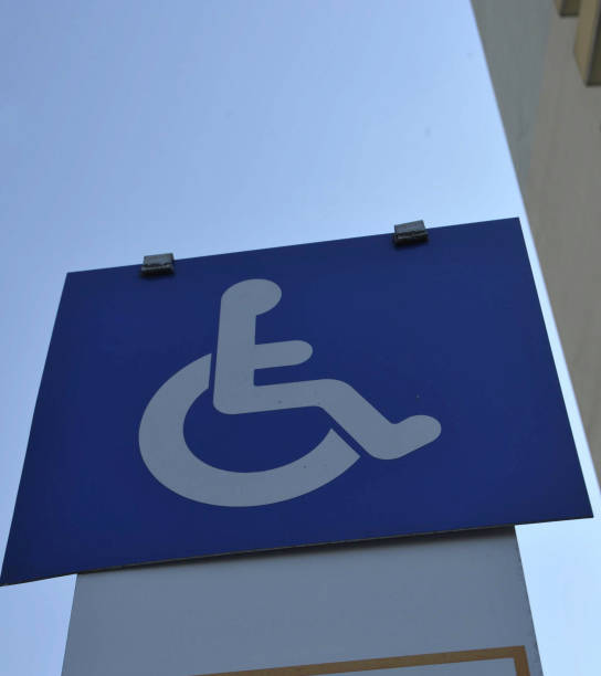istock handicapped or disabled parking space traffic sign 1300013870