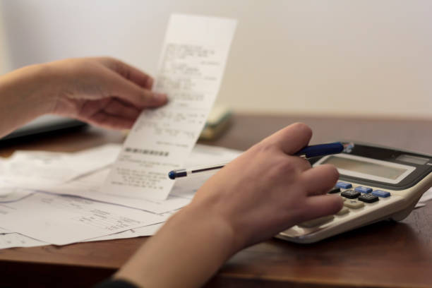 istock Woman doing financial accounting 1300014125