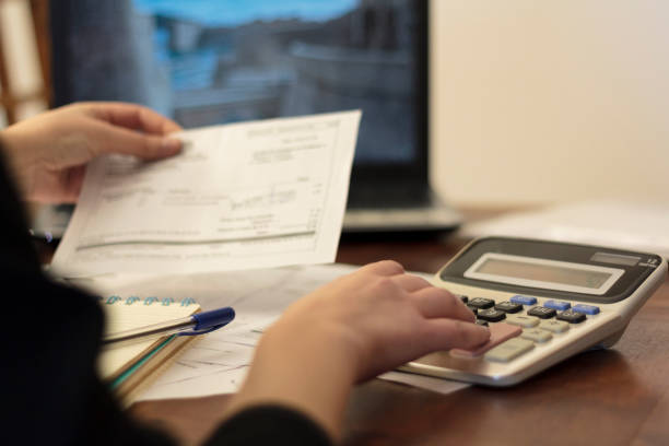 istock Woman doing financial accounting 1300014127