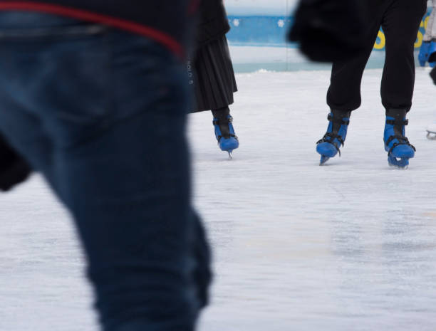 istock ice skating in winter on a skating rink 1300014228