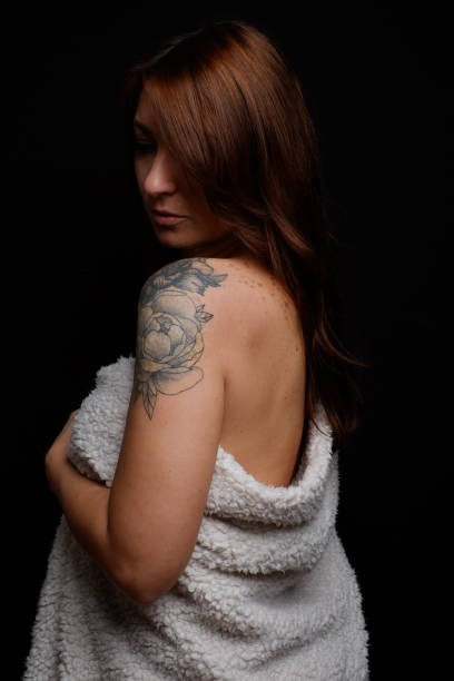 istock profile of Beautiful Woman with black Background 1300015576