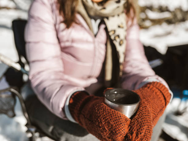 istock Mature woman drinking tea outdoors 1300015885