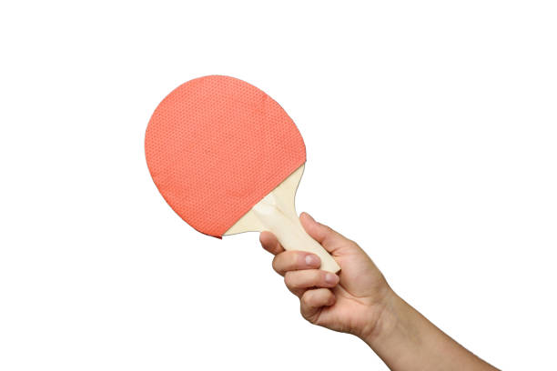 istock female hand holds two wooden table tennis racket 1300018213