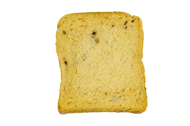 istock Slice of fresh white bread with spices isolated on a white background 1300018274