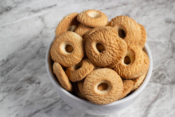 istock Ring Coconut biscuits served on a bowl. Brazilian little donut. Seletive focus 1300020945