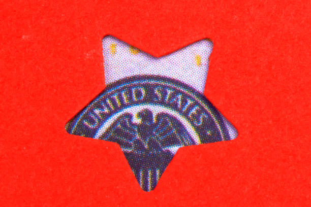 American Dollar banknotes looking from star shaped red paper background.
