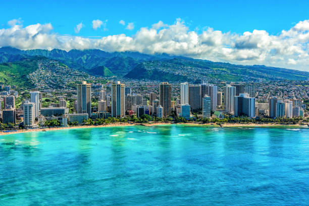 Waikiki Area of Honolulu Skyline Aerial Aerial view of Waikiki Beach and the hotels lining it in the beautiful city of Honolulu along the Pacific Ocean in the state of Hawaii, USA. oahu stock pictures, royalty-free photos & images