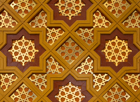 Gypjak, Ashgabat, Turkmenistan: seamless Islamic pattern in wood and metal - gate of the Turkmenbashi Ruhy Mosque / Kipchak Mosque - Pattern of eight-pointed stars, Rub el Hizb octagram (represented as two overlapping squares), aka Najmat -al-Quds or the eight-pointed star of Jerusalem.