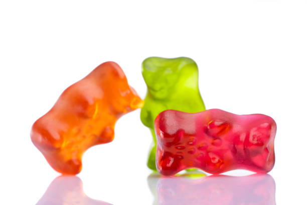 istock Sweet gummy bears on white 1300025171