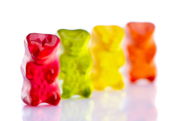 istock Sweet gummy bears on white 1300025559