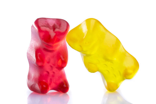 istock Sweet gummy bears on white 1300025610