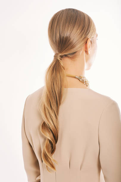 istock Beautiful hairstyle tail for wedding or formal party, back view, isolated on white background 1300026489