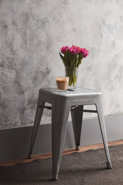 istock Flower latte art on white table minimalist lifestyle 1300026553