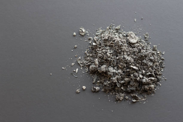 istock Pile of ashes on dark background 1300027190