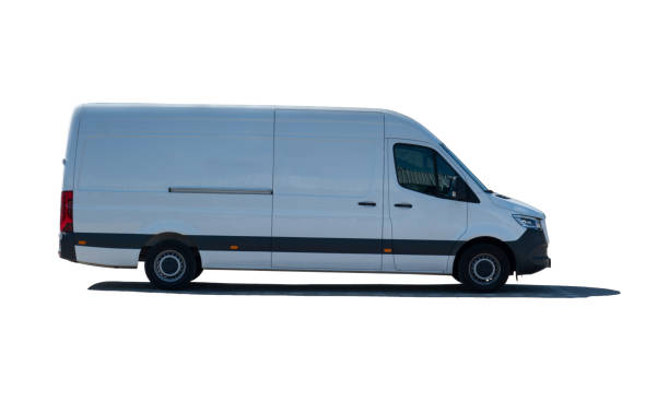istock Side view of white delivery van - isolated on white 1300029848