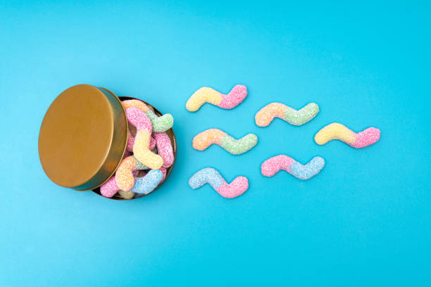 istock Vibrant sugar coated gummy worms in a tin box 1300033034