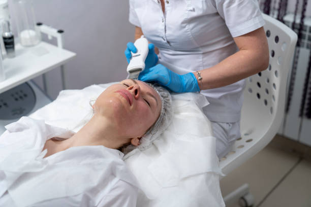 istock cosmetologist performs facial skin cleansing procedure 1300033693