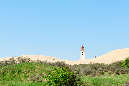 A landscaped view to the famous lighthouse on Rubjerg Knude near Loenstrup in northern Denmark