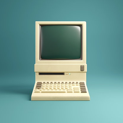 Retro 1980's style beige desktop computer and built in screen and keyboard.  3D illustration.