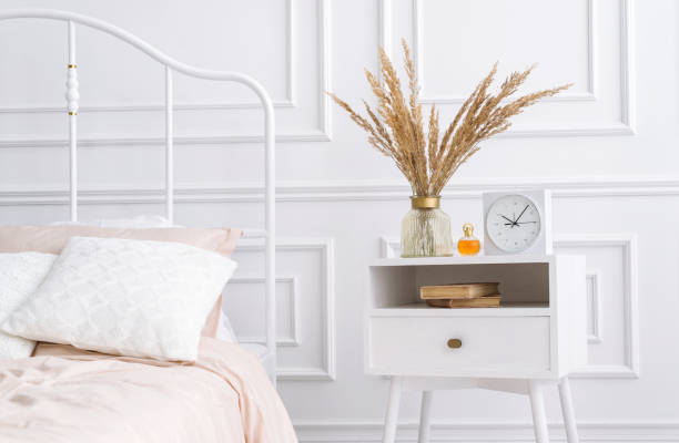 istock Interior of modern bedroom with cozy double bed 1300036803