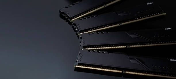 istock New DDR4 RAM modules  on a black table. Electronic repair shop, technology renovation, business, concept repairs with copy space 1300036828