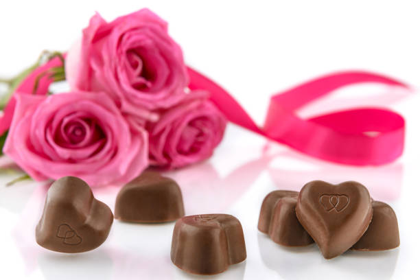 istock Chocolate and pink roses 1300040160
