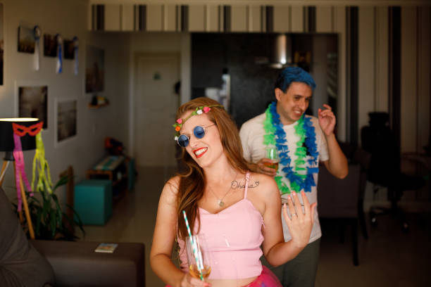 istock Couple having fun dancing at home 1300041318