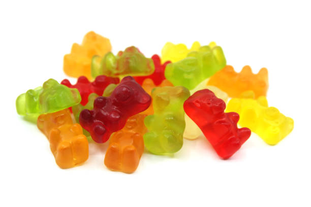Gummy bears candies Colourful gummy bears candies isolated on white background. Fun candy macro shot gummi bears photos stock pictures, royalty-free photos & images