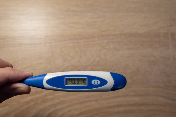 istock thermometer marking high fever due to coronavirus. COVID-19 1300045697