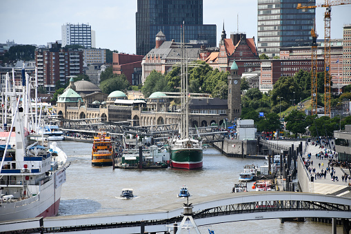 Hamburg, Germany - July 3, 2019: View of the Port of Hamburg, including the St. Pauli Landungsbrücken (St. Pauli Piers).