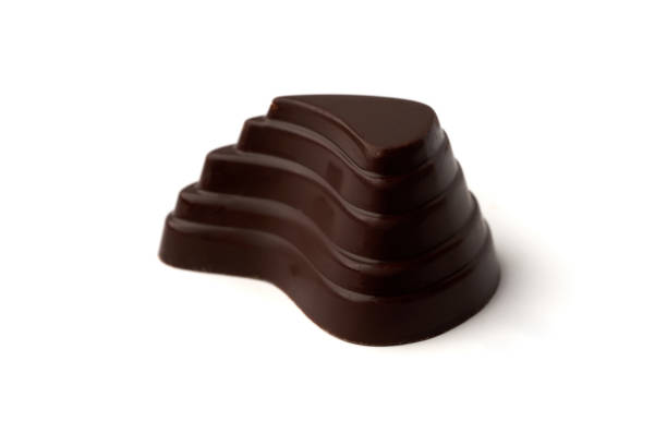 istock Close-up of chocolate candy isolated on white background 1300046730