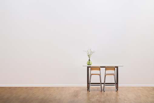 This is a photograph of Barren Room with Blank White Wall