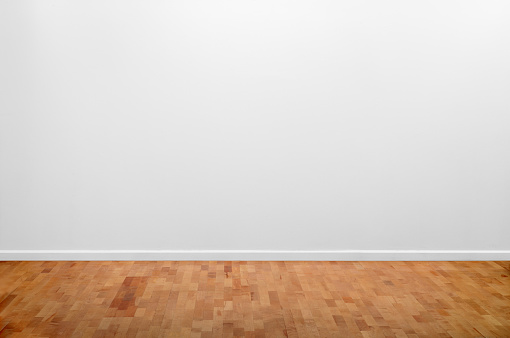 This is a photograph of Barren Room with Blank White Wall