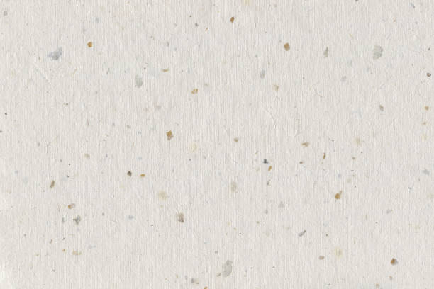 Natural Decorative Recycled Spotted Beige Grey Taupe Tan Brown Spots Paper, Horizontal Texture Background, Vertical Crumpled Handmade Rough Rice Straw Craft Sheet Textured Macro Closeup Pattern, Blank Empty Vintage Copy Space stock photo