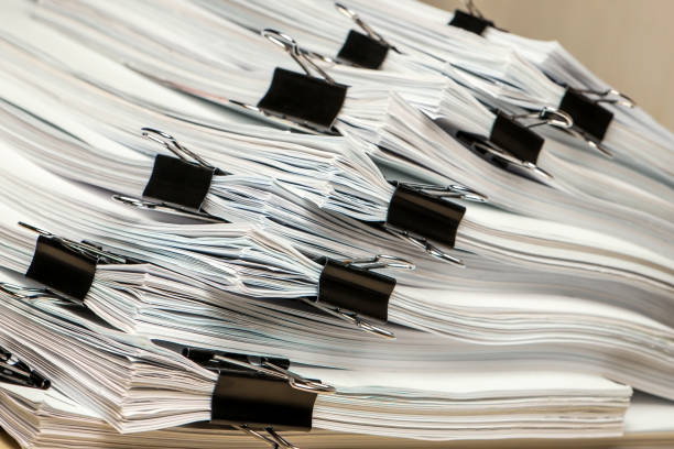 istock pile of paper documents in the office 1300067127