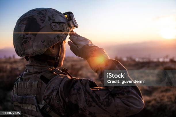 Female Army Solider Saluting Against Sunset Sky Stock Photo - Download Image Now - Military, Armed Forces, Army Soldier