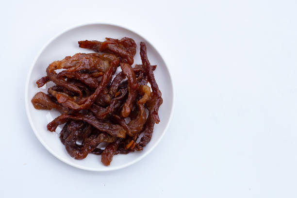 istock Deep fried sun-dried pork on white background. 1300076563