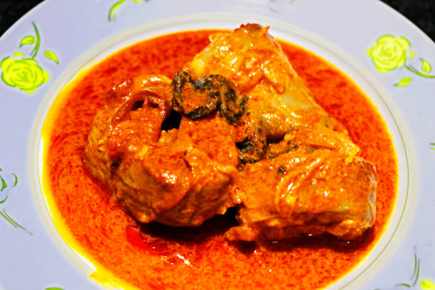 istock fish curry, kerala style with hot and spices 1300080811
