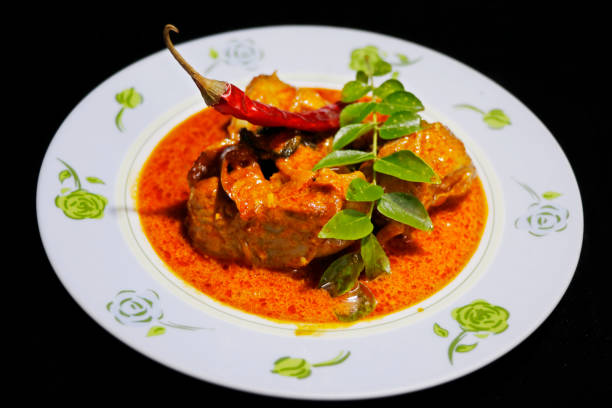 istock malabar fish curry, kerala style with hot and spices 1300080816