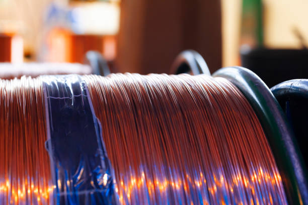 istock Copper wire reels in cable factory close up 1300082349